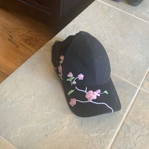 Pink white black hat